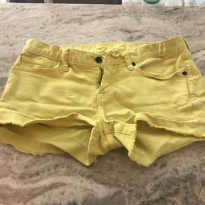 Yellow denim shorts